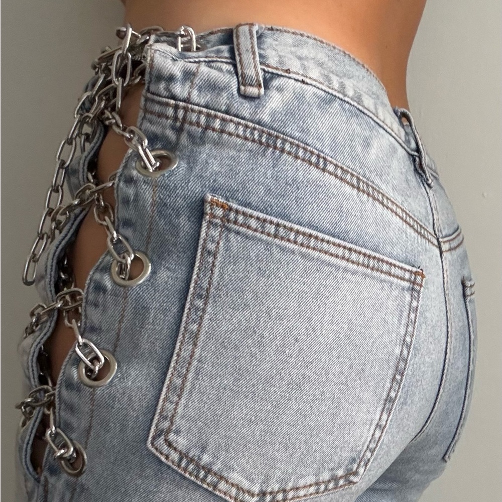 Ripped Lace Up Chain Denim Pants